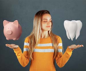 Woman balancing piggy bank and tooth