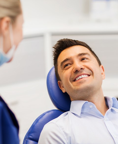 Man smiling after oral cancer screening