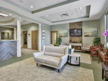 Cozy waiting room of dental office in Fayetteville