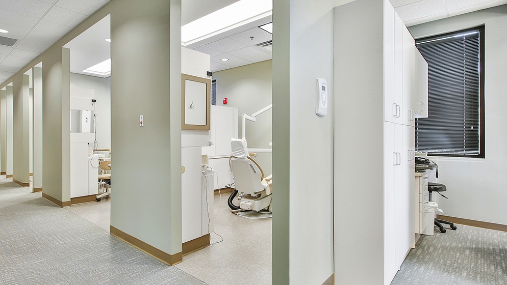 Hallway looking into dental office treatment rooms