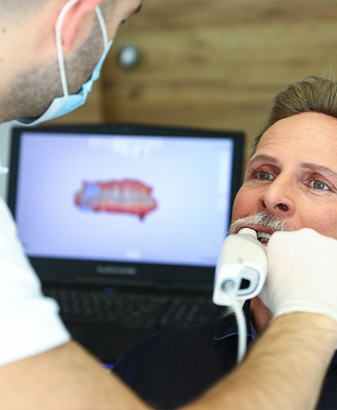 Dentist using digital impression system